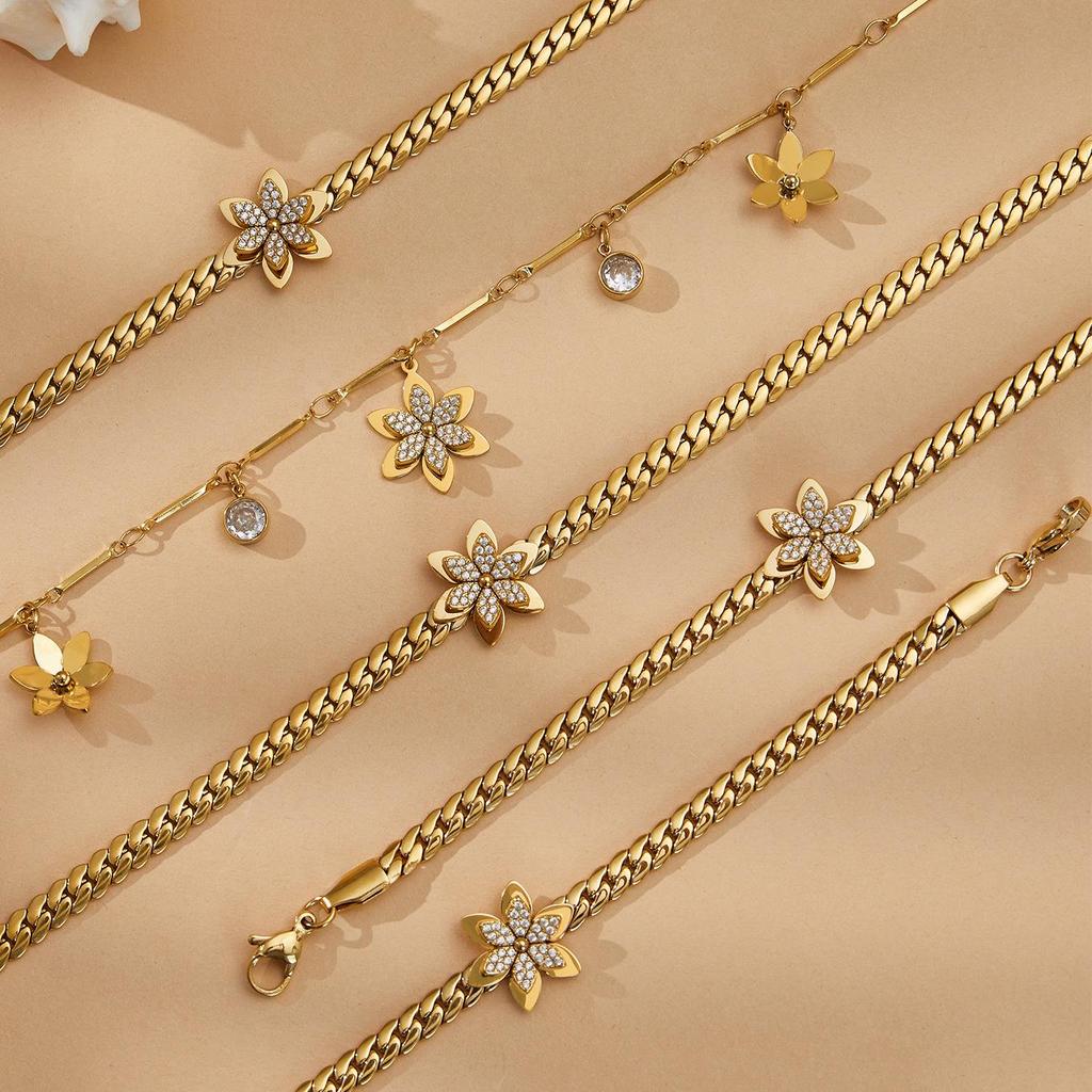 Exquisite 18k Gold-Plated Zircon Flower Jewelry Set: Stackable Stainless Steel Bracelet and Necklace.