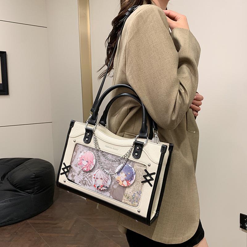 Autumn and winter new niche design pain bag women's large food volume two-dimensional sweet cool handbag college style messenger bag