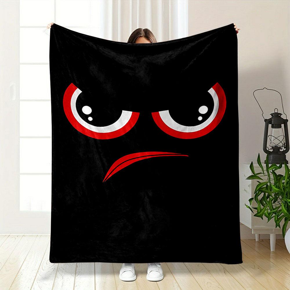 Red and white angry eyes with an arched red frown on a black background. for all seasons blanket lunch break throw gift