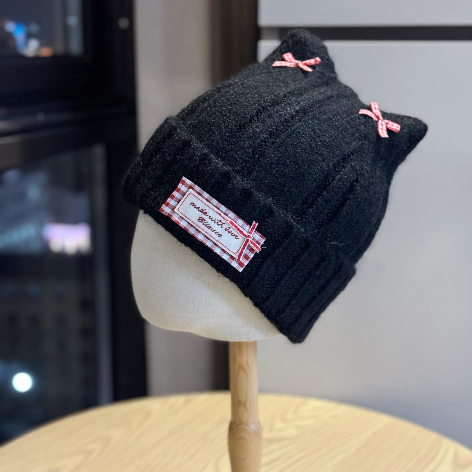 

Korean-style woolen hat for women with cute cat ears, new bow design, warm ear protection, cold weather hat, fashionable knitted hat for winter Adult54-60Average Size чёрный