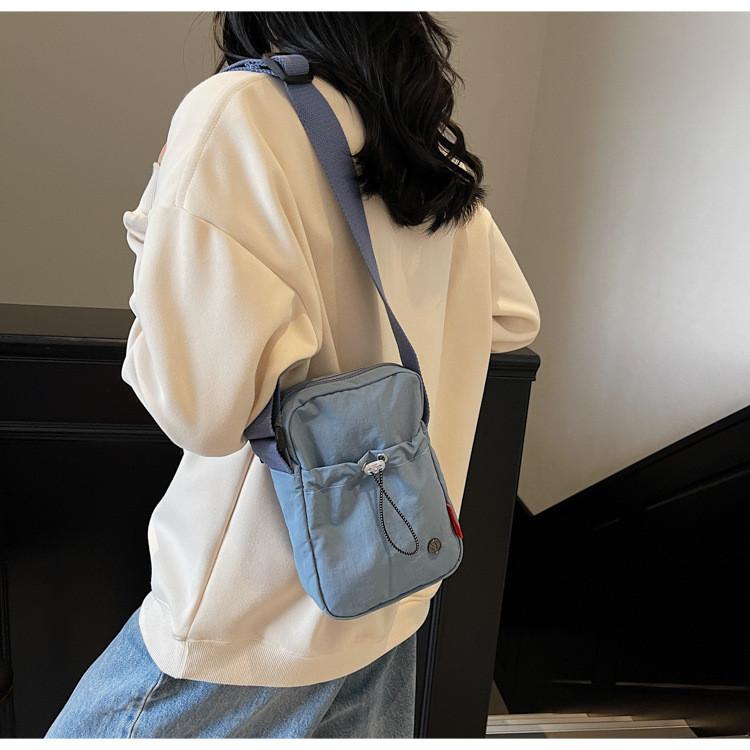 Mini Crossbody Bag For Women With Nylon Material And Zipper Closure For Daily Use