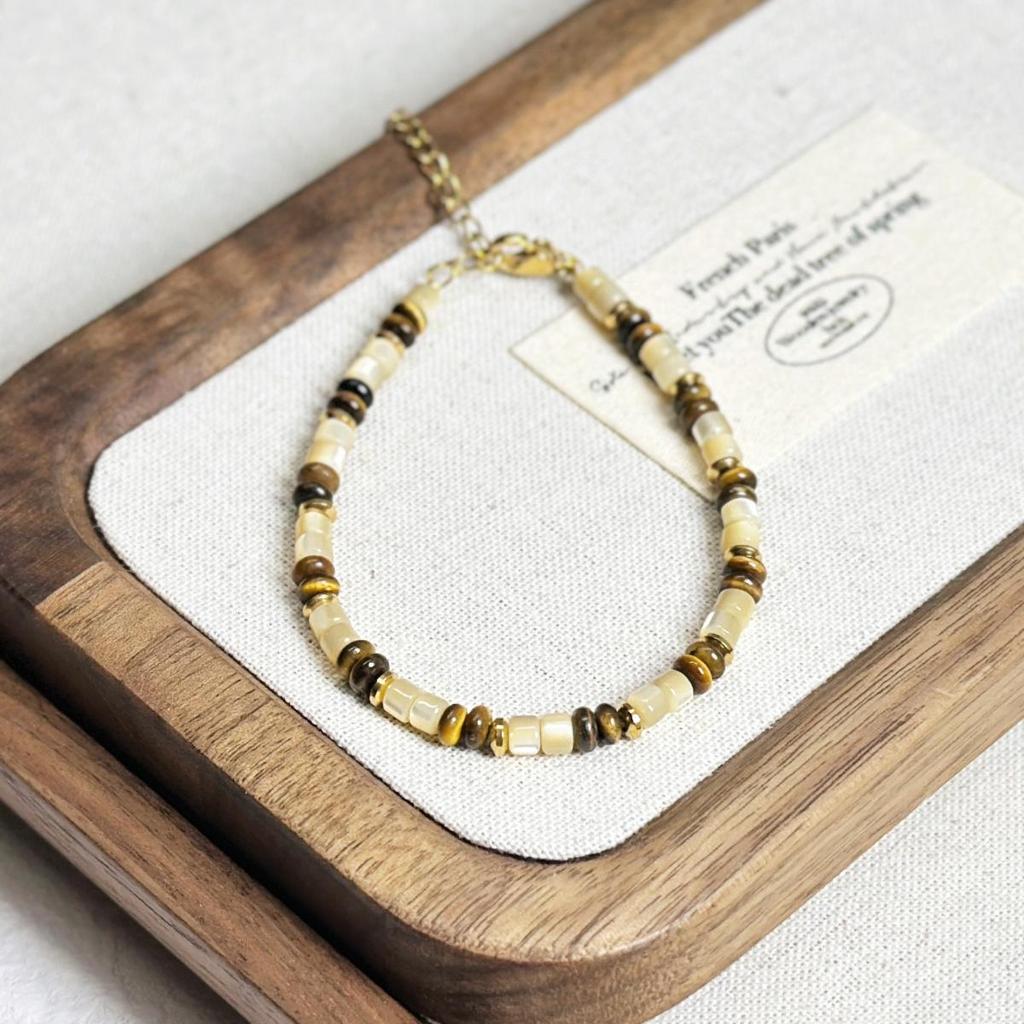 Tigeröga Snäckskal & Fröpärlor Armband - Nischad Design