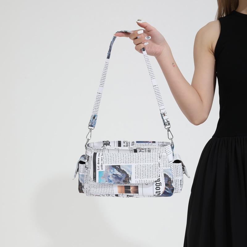 Personalized newspaper bag summer 2025 new Korean version fashion printing trend ins women's shoulder armpit bag pu