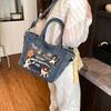 2025 New Trendy Cartoon Cat Print Denim Bucket Bag Versatile Casual Commuter Large Capacity Crossbody Shoulder Bag for Women