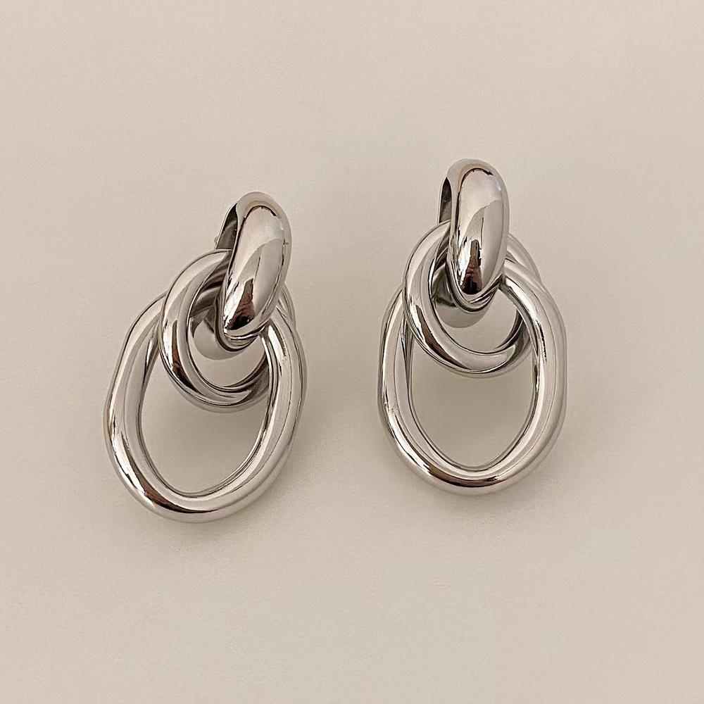 Gold-Tone Geometric Twist Earrings: Fashionable and Versatile Multi-Layer Braided Earrings for Women.