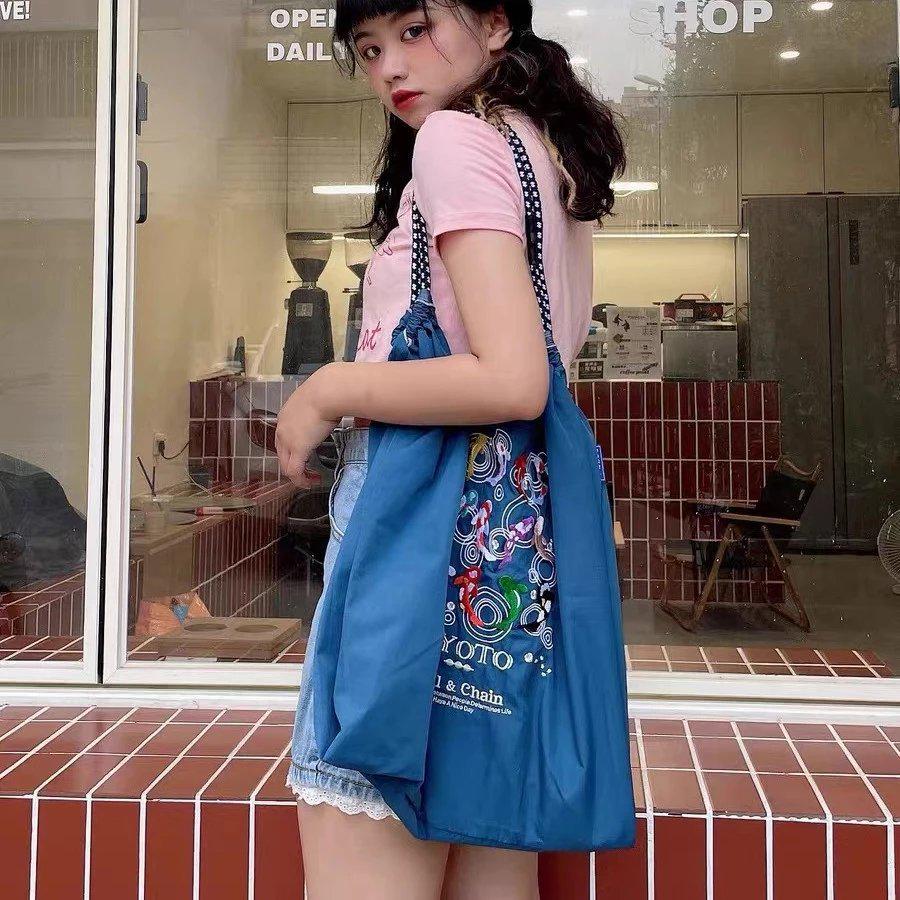 Trendige blaue bestickte Bucket Bag - Vielseitige Handtasche aus Oxford-Gewebe mit großem Fassungsvermögen