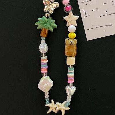 Telefoon accessoires – Telefoonbandjes en sleutelhangers