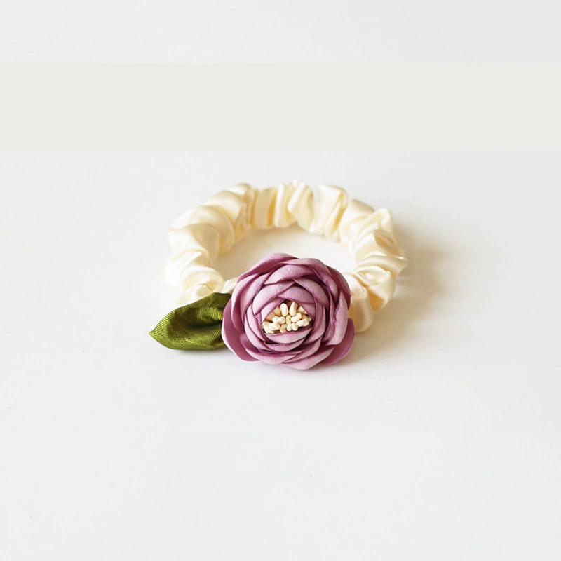 

Beautiful camellia hair band headband female side braided hair accessories low ponytail head flower hair rope headdress