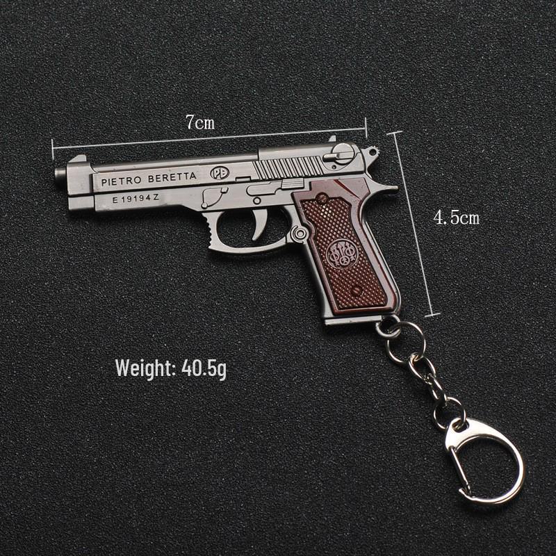 

«Хит продаж: игрушечная металлическая модель автомобиля и брелок для выживания»