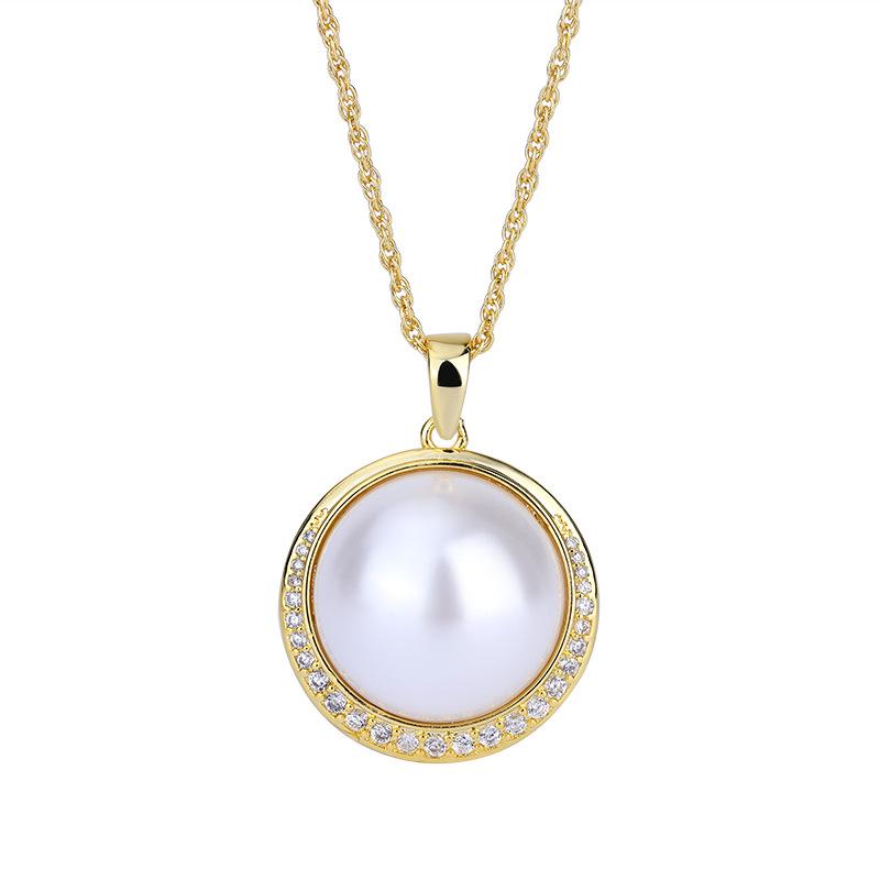 

Ювелирные изделия Медное дно Позолоченные инкрустированные белые бусины Подвеска Ожерелье Ретро Ювелирные изделия Аксессуары Бусины 20 мм