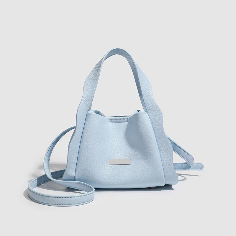 

Портативная сумка-корзина для овощей женская 2025 новая весна-лето на косую через плечо сумка-ведро для поездок на работу универсальная однотонная из мягкой кожи маленькая сумка