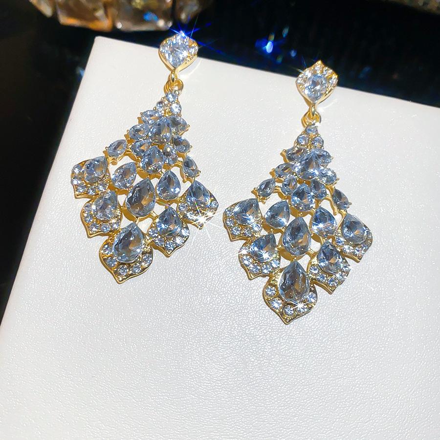 Silver Needle Super Flash Diamond-set Hollow Water Drop Geometric Stud Earrings, Light Luxury Niche High-end Earrings for Women
