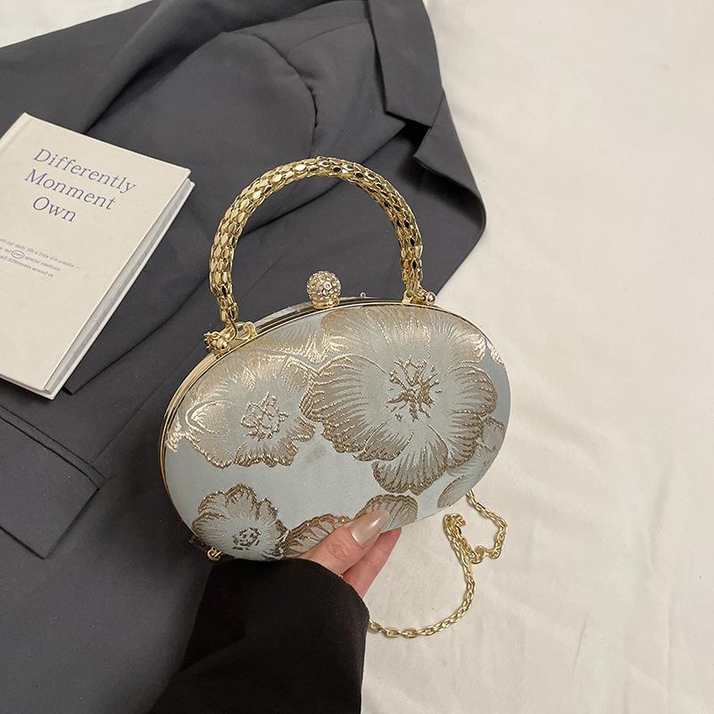Design niche ball bag women's new portable fashion chain small bag dinner mini embroidered oblique span bag