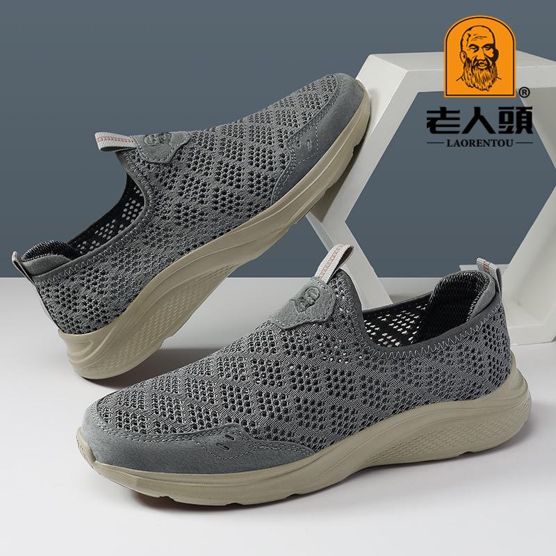 Chaussures pour hommes en maille tricotée volante ajourée respirante à trous chaussures décontractées à une pédale printemps et été tige basse ensemble pied course