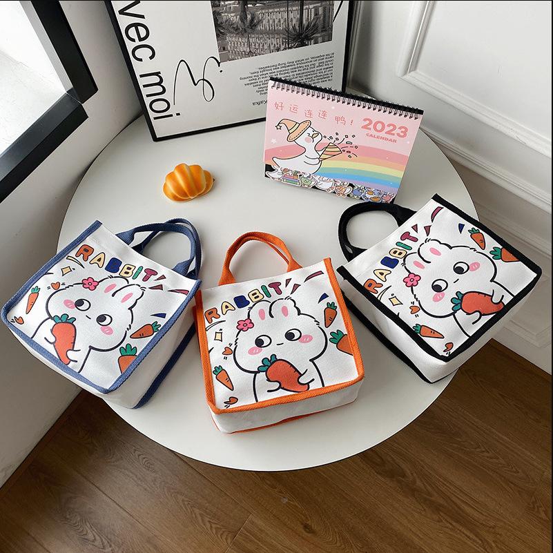 Japanese cute canvas bag bunny printed cartoon less tutoring bag go out hand carry bento bag wholesale