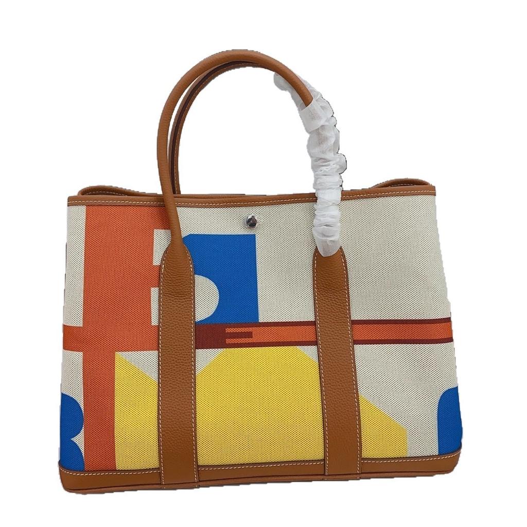 2025 Canvas With Top Layer Cowhide Women's Bag Garden Handbag Large Capacity Leather Contrasting Single Shoulder Tote