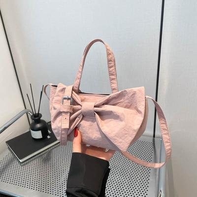 Hochwertige ästhetische Schleifen-Handtasche Sommer neue Nischen-Design Pendler Schulter-Umhängetasche