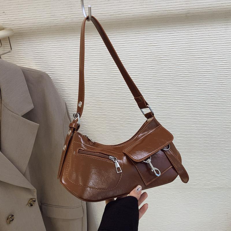 

Новая высококлассная сумка-пельмень, модная универсальная на плечо, подмышку, популярная сумка-мессенджер коричневый