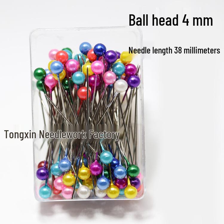 

Перламутрові кольорові пластикові шпильки для позиціонування одягу та хіджабу в коробці