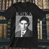 Maglietta FRANZ KAFKA | Scrittore de La Metamorfosi e Il Processo | T-shirt Ispirata all'Autore | Maglietta Genio Letterario | Top Letteratura Classica | Filosofico