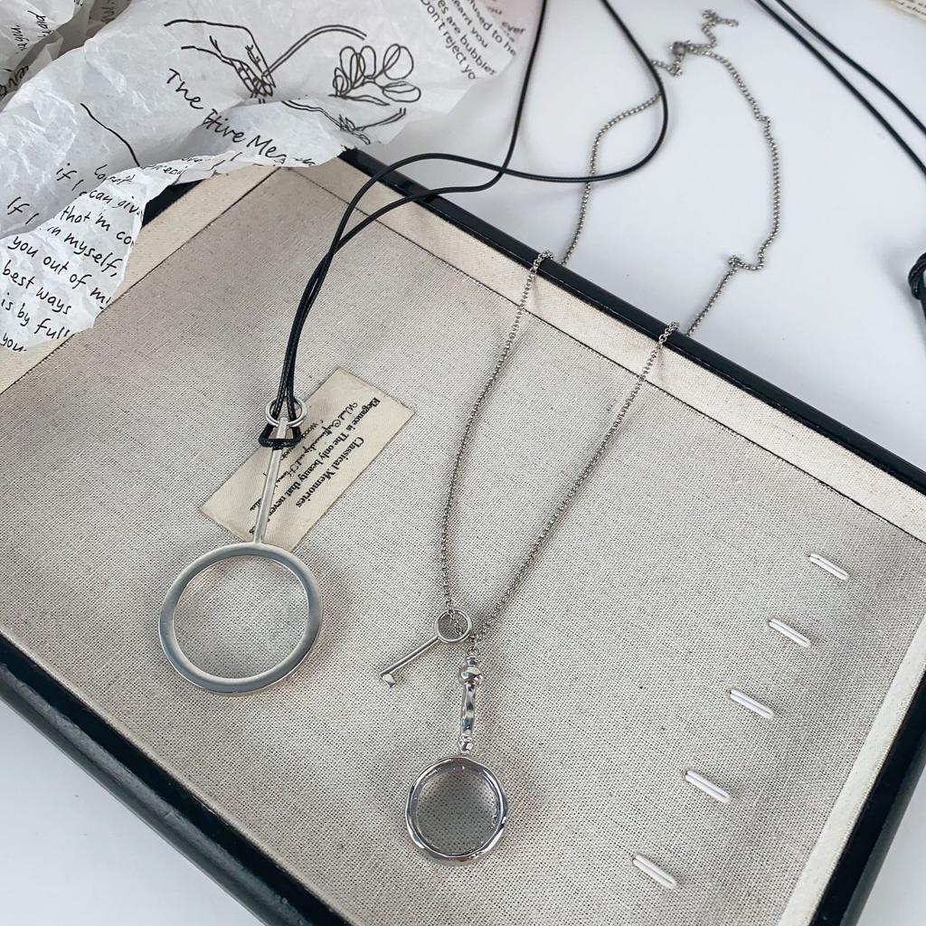 Blogger same magnifying glass pendant long necklace women's light luxury niche high sense retro ins black rope sweater chain