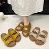 Seaside beach sandals with buckle round skirt cool slippers women's retro one-word thick-soled slippers 2025 summer
