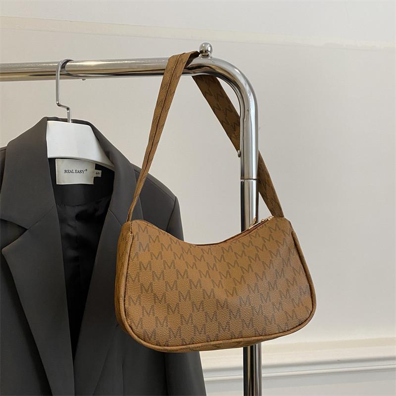 Stylish Medium Sized Women s Crossbody Bag With Unique Crescent Shape Design StyleE