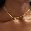 18K Gold-Plated Snake Bone Chain Necklace with Cross Bow Pendant