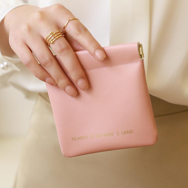 

PU Waterproof Automatic Closing Makeup Bag: Convenient On-the-Go Touch-Up Storage with Snap Closure