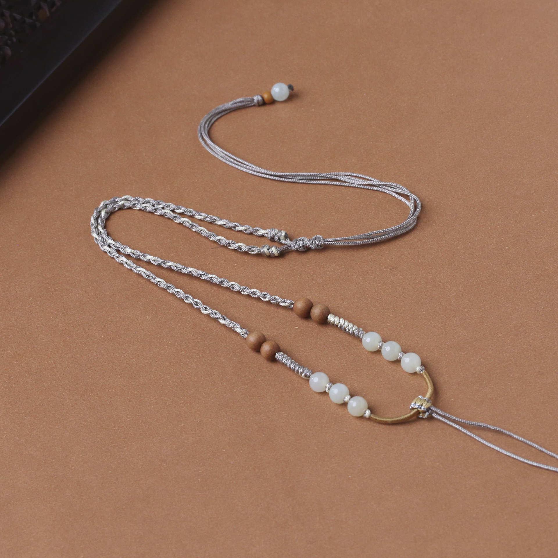 

Изысканное ожерелье с подвеской из нефрита на тонкой красной веревочке для мужчин и женщин