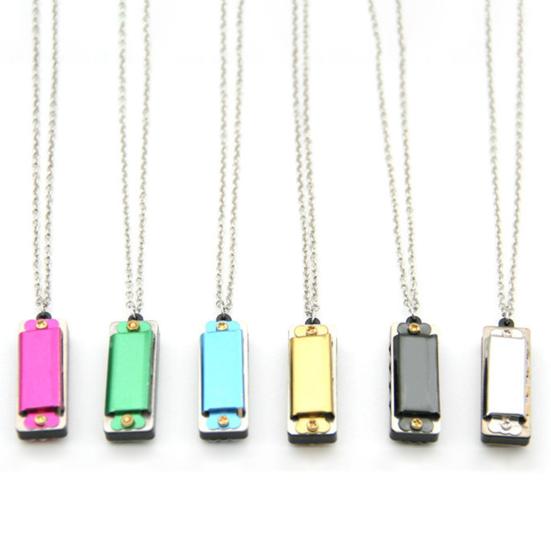 8 Tone 4 Holes Mini Harmonic Pendant Metal Musical Instrument Toys Harmonica Pendant