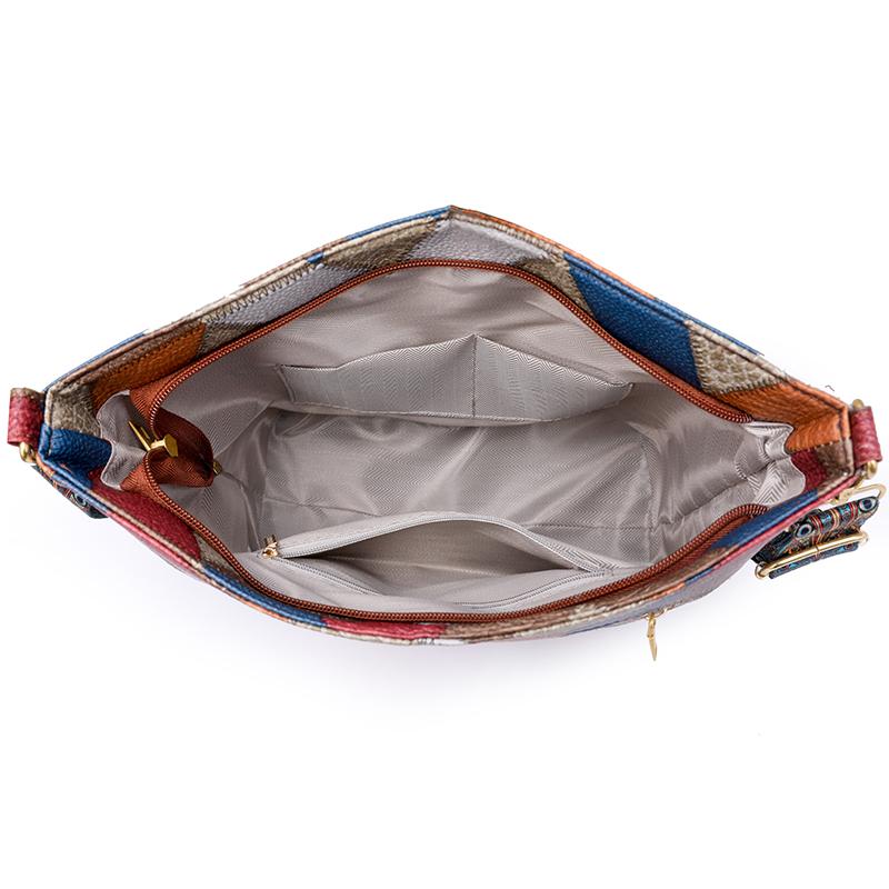 Мягкая кожаная большая сумка контрастного цвета с вышивкой — фото 9