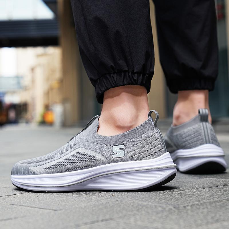 Flygande vävda sportskor med mjuk sula och andningsförmåga damskor 2025 höst nya utrikeshandel fritidsskor herrskor en pedal