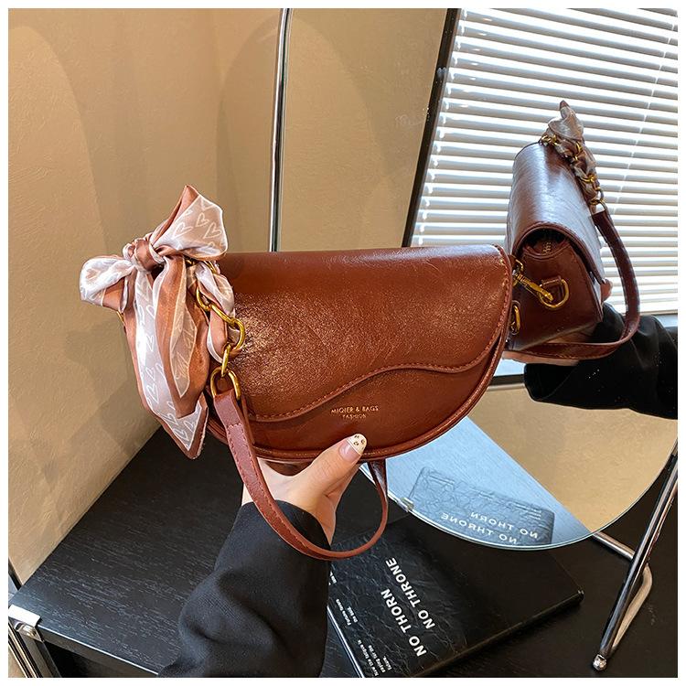 

Bag Commuter messenger bag Saddle bag Simple shoulder bag Femininity women s bag Underarm bag коричневый