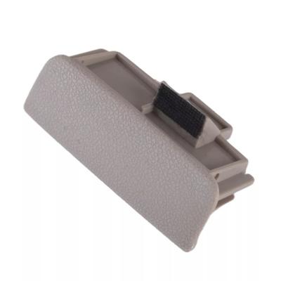 Smėlio spalvos skyriaus pirštinių dėžutės fiksatoriaus rankenėlė Kia Sportage 2005-2010 m. 84560-1F100EZ