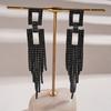 Zircon diamond-encrusted hollow square fringed silver needle earrings, dark wind personality, light luxury earrings.