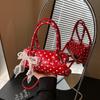 Niche design bag women's 2025 new summer shoulder messenger bag polka dot portable cylinder bag