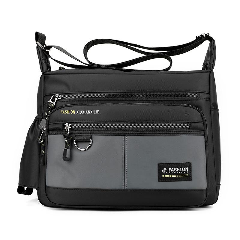 New men s casual simple messenger bag New commuting large-capacity men s bag Outdoor travel multi-layer messenger bag серый