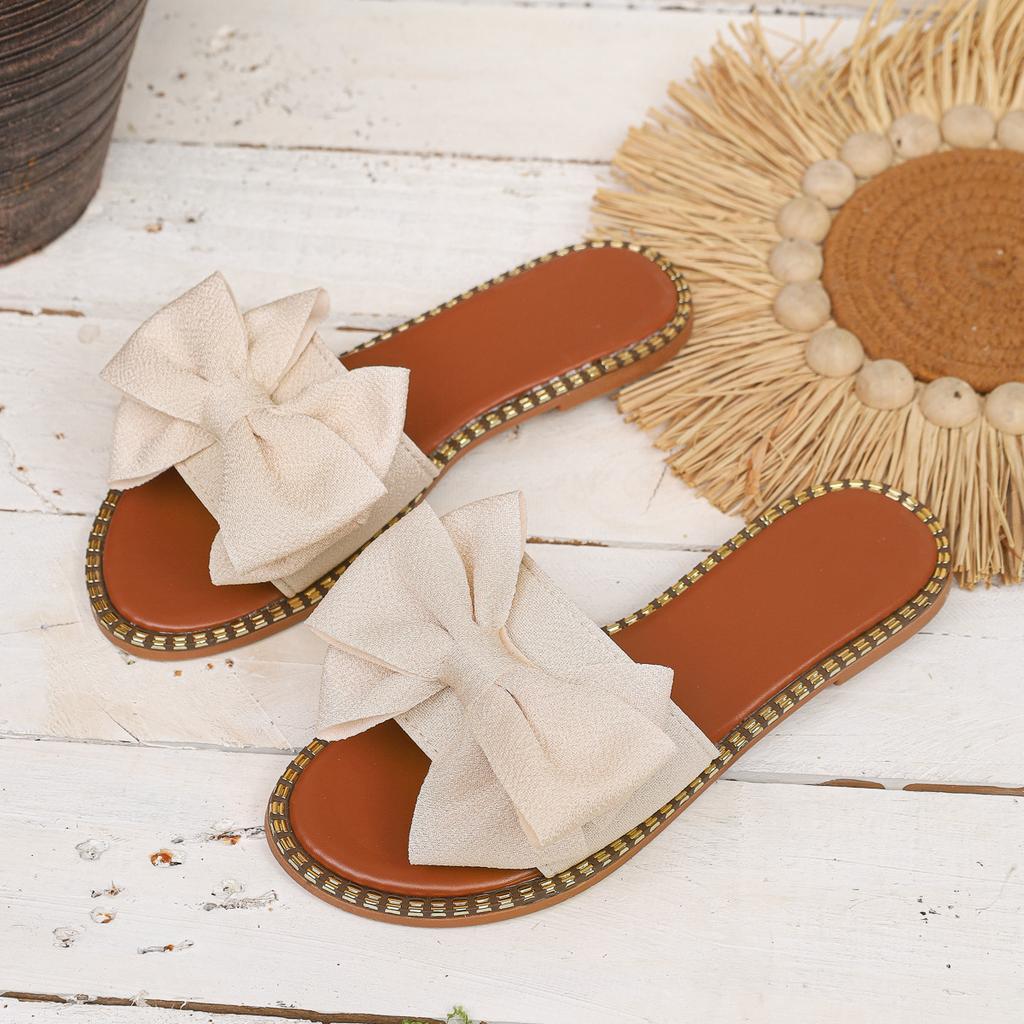 2026 New Flat Bottomed Rhinestone Bow Straight Slippers for Women Wearing Solid Color Lightweight Cloth Surface Sandals