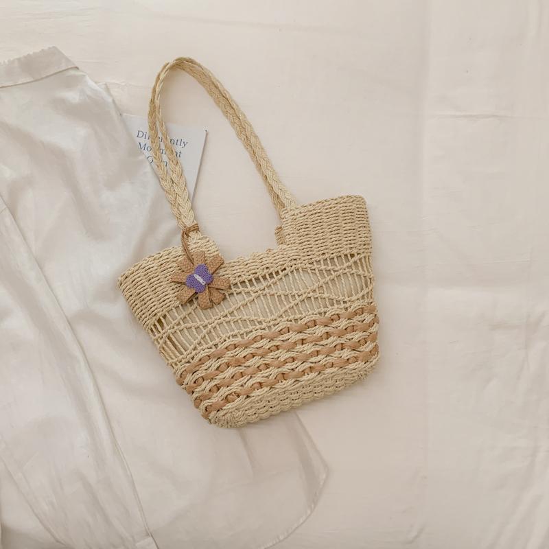 Handwoven Natural Fiber Tote Bag with Braided Handles and Open Weave Design