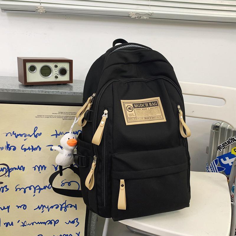 Fashionable Water-Repellent Student Backpack: Trendy High-Capacity Design for Couples