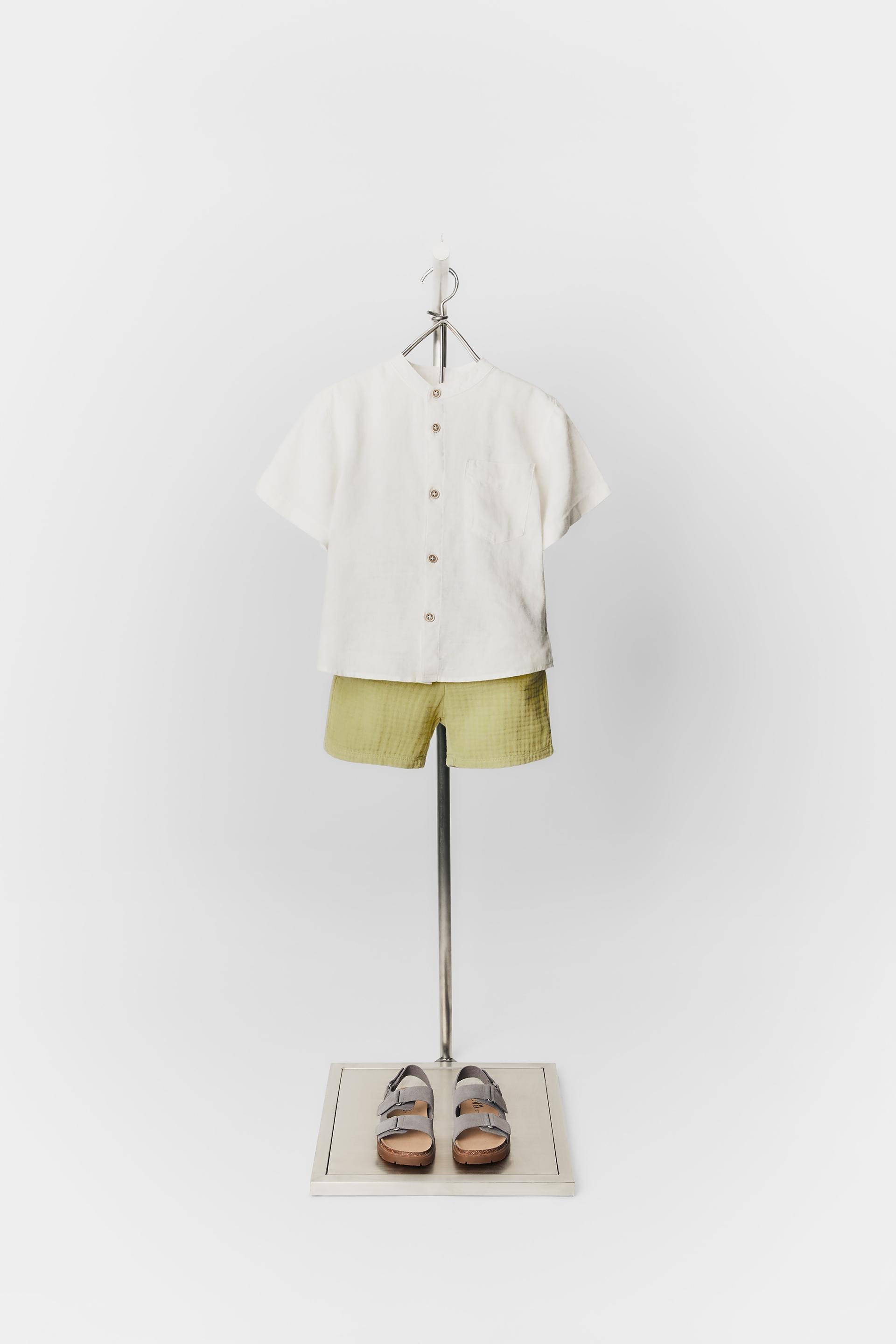 

ТЕКСТУРИРОВАННЫЕ ШОРТЫ-БЕРМУДЫ С ПУГОВИЦАМИ