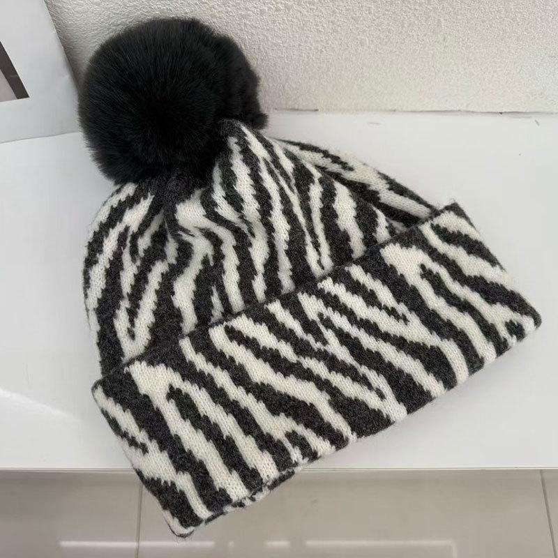 Zebra pattern hairball knitted hat women's autumn and winter retro versatile face small wool hat cold-proof warm ear hat