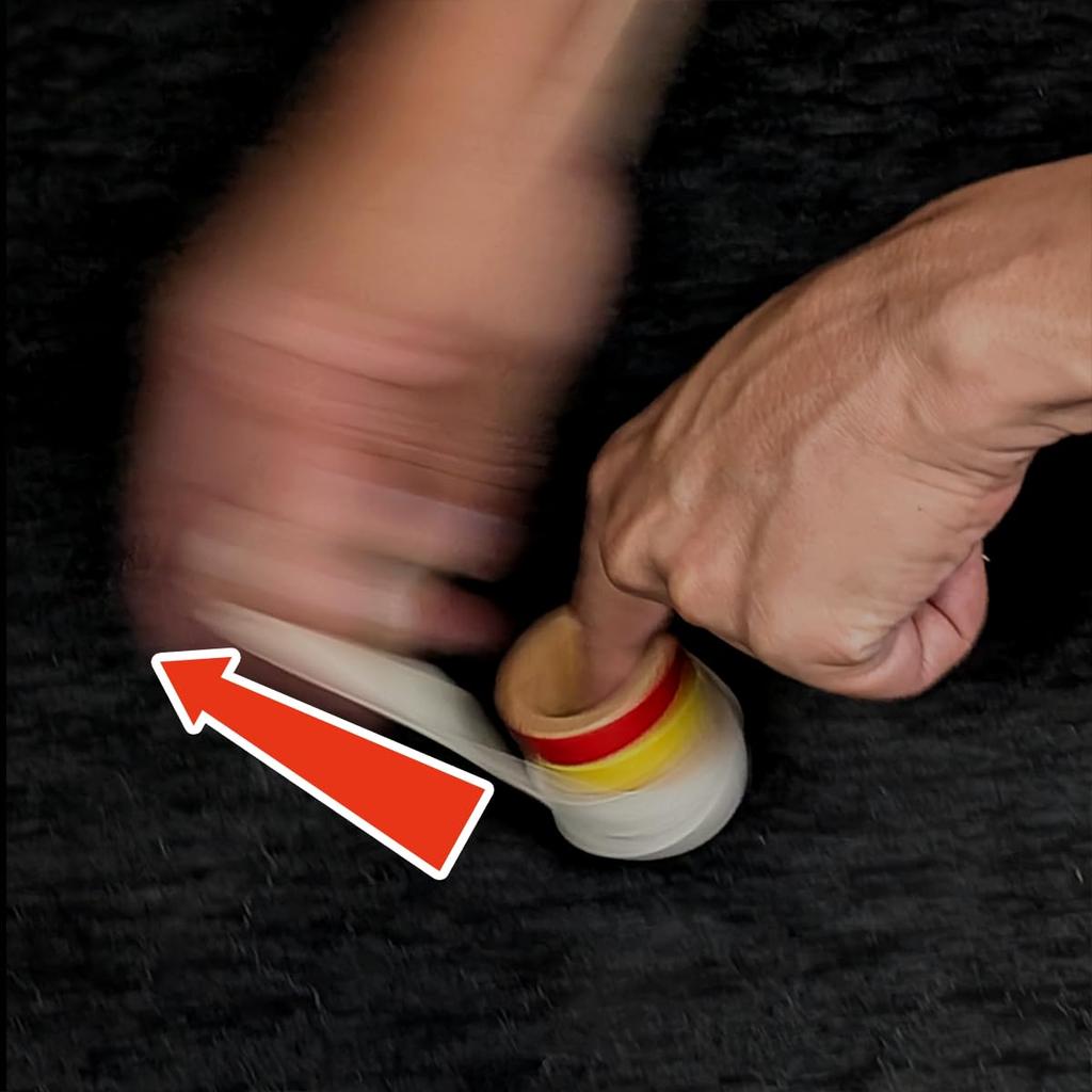 Spin Gear - A Traditional Spinning Top Spun by Hitting It with a String. It Spins Well On Its Iron Axis (colored).