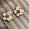 Silver Needle Camellia Drip Oil Earrings: Elegant French Retro White Flower Studs