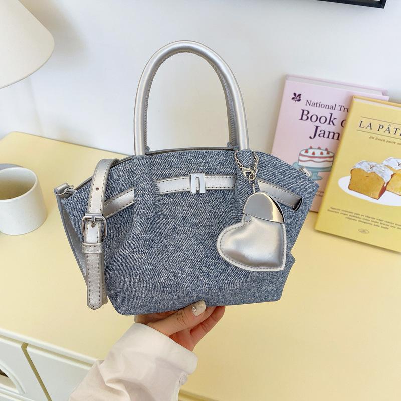 Korean senior sense of bucket shape soft and durable fashion exquisite new light luxury commuting slanting cross shoulder handbag