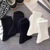Socks black and white solid color four-season sports socks breathable sweat-absorbing deodorant men's and women's medium tube socks
