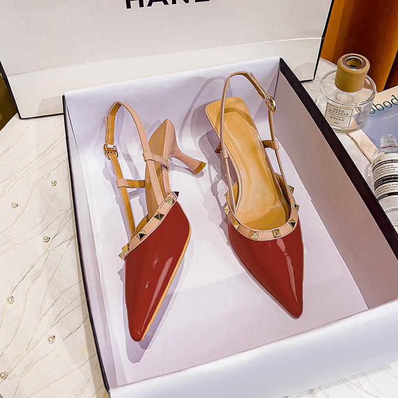 Baotou sandals women's 2025 new rivets one-word buckle belt fairy wind back empty single shoes pointed high heels stiletto