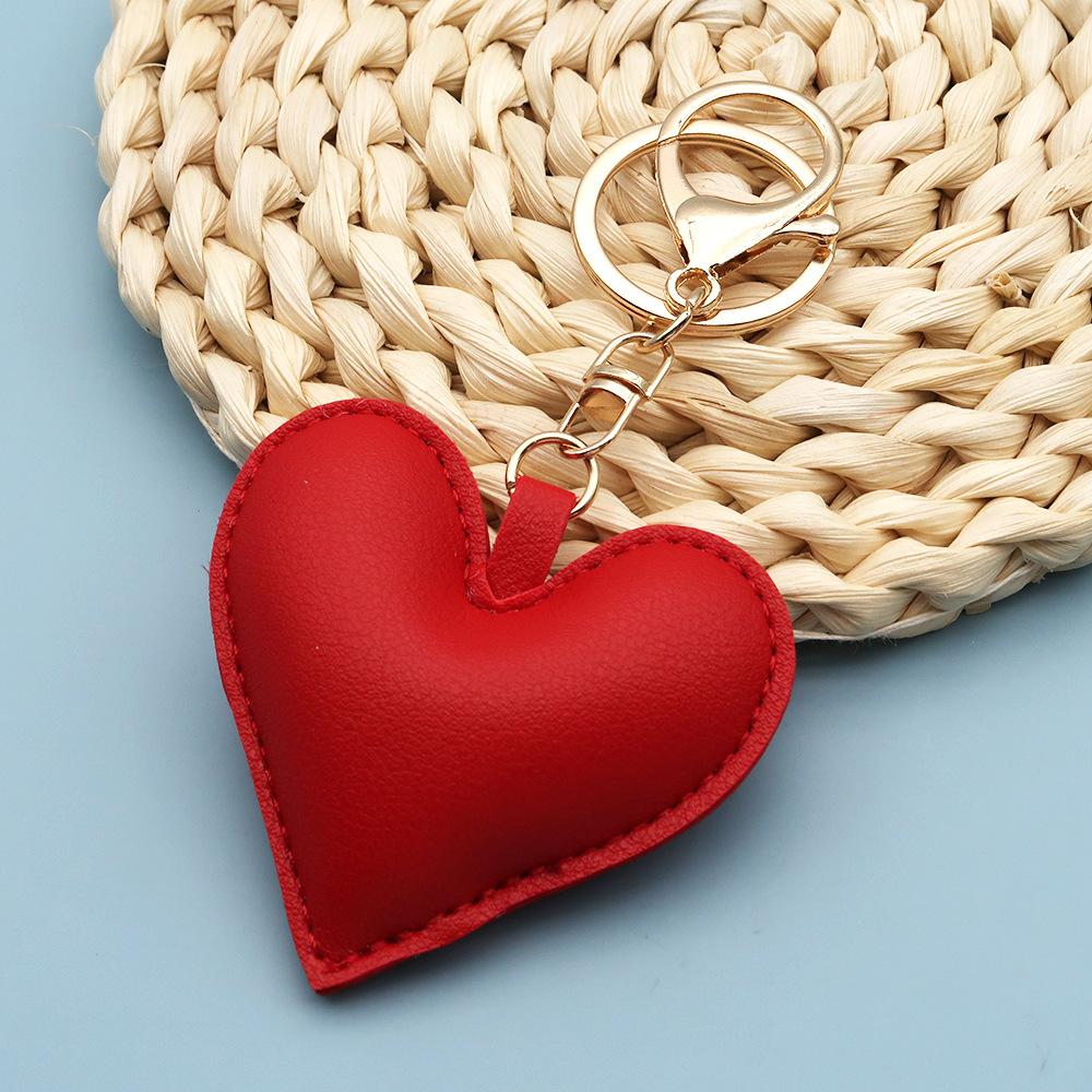 Spot wholesale PU simple peach heart bag pendant Xiaohongshu explosive love couple pendant keychain bag lanyard