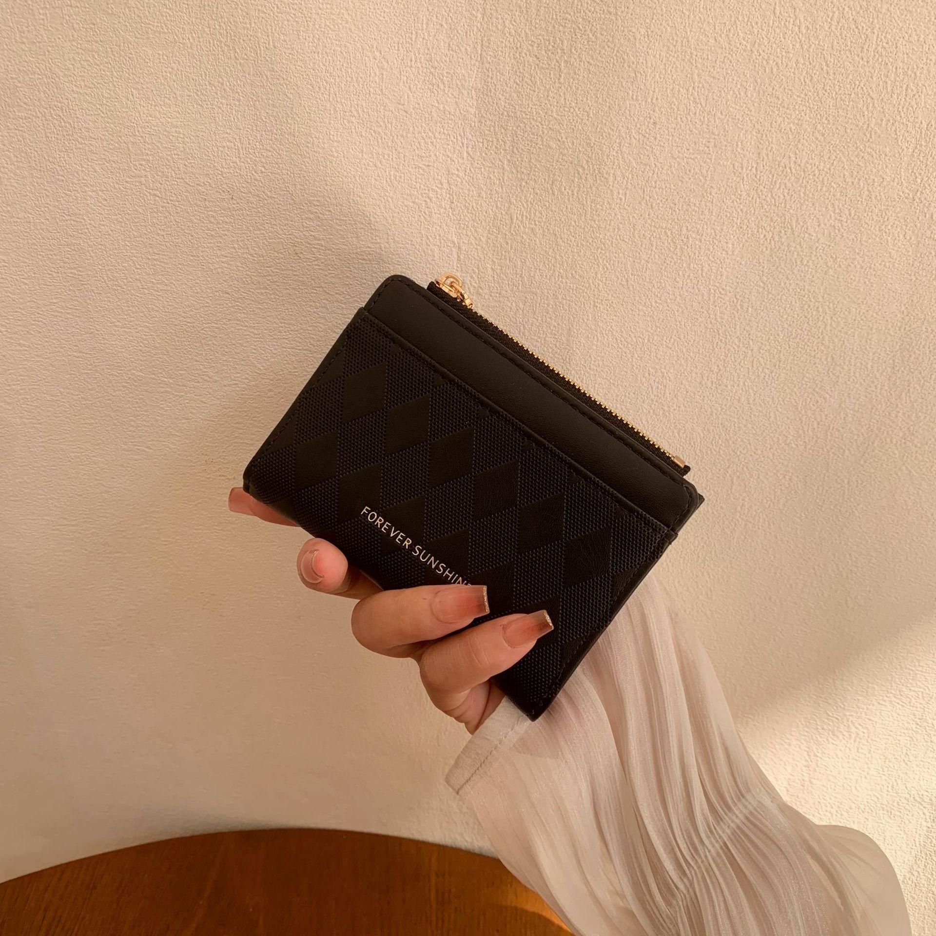 

Новая стильная и простая женская сумка для смены ins из премиальной кожи, специальная кожа с призматической печатью, маленький кошелек для женщин чёрный